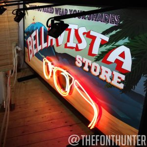 cartel y neón personalizado para tienda